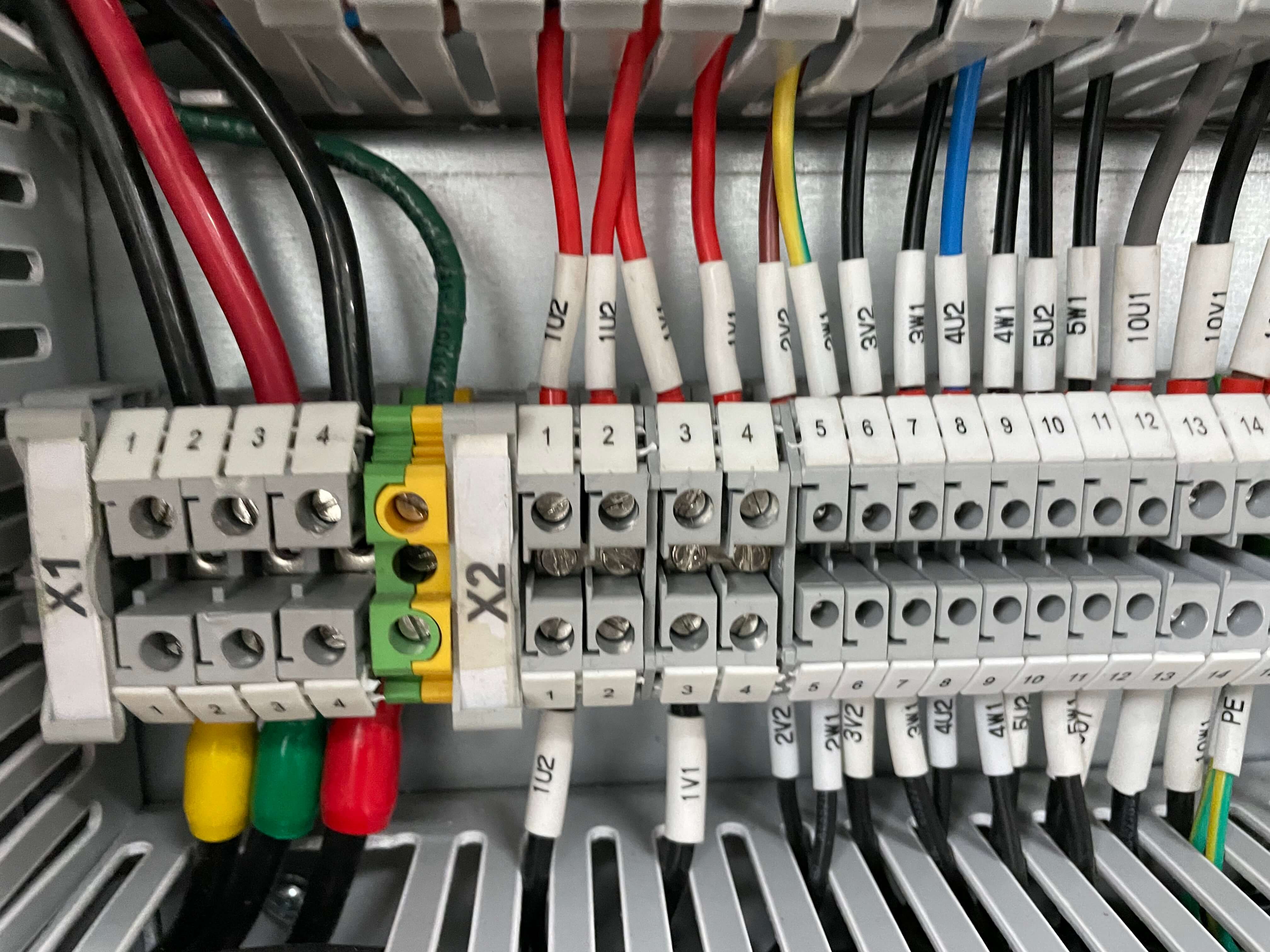 Precision terminal block wiring for high-voltage distribution
